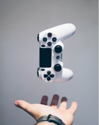 Image of a joystick floating above a hand